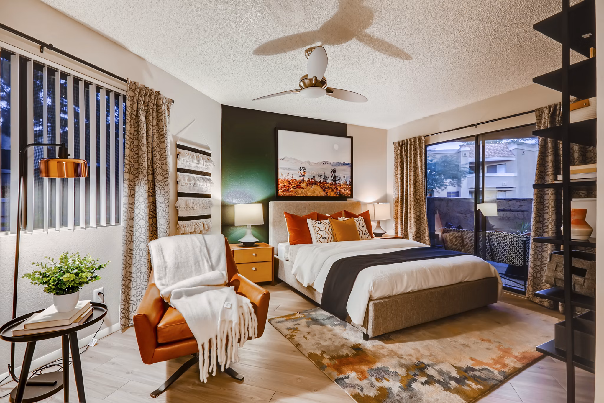 Espiral Apartments: Modern bedroom with cozy decor and natural lighting, perfect for luxury living