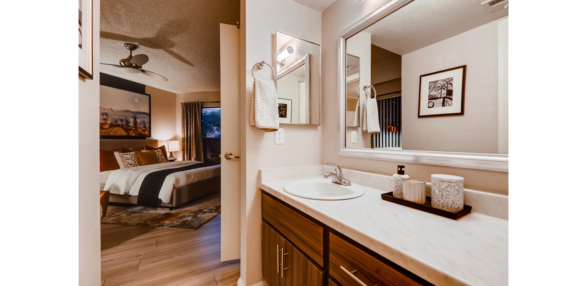 Bathroom featuring modern fixtures and marble countertops at Espiral Apartments, luxury living by Greystar