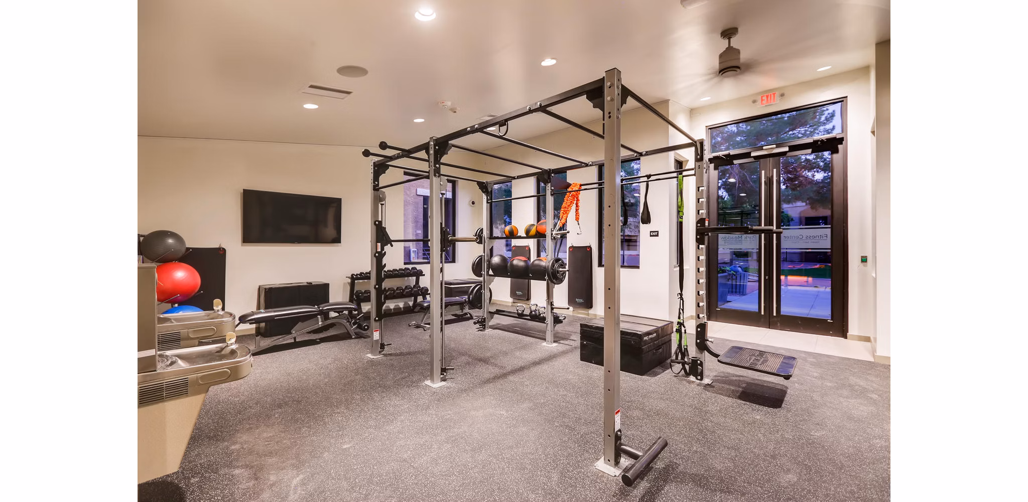 State-of-the-art fitness center with modern equipment at Espiral Apartments' luxury community