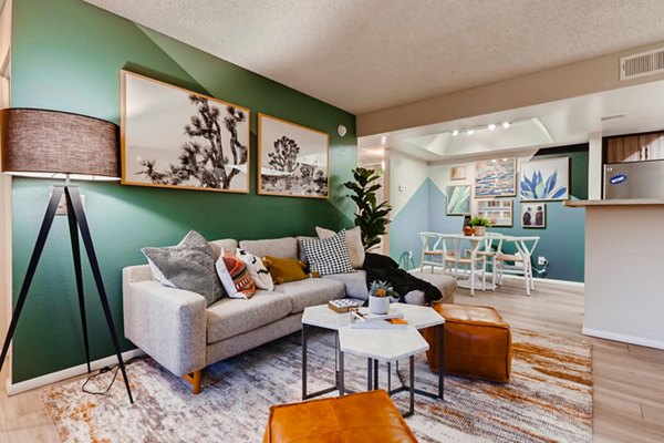 Modern living room with stylish decor and natural light at Espiral Apartments
