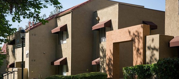 The Highlands at Grand Terrace: Elegant building facade of luxury apartments