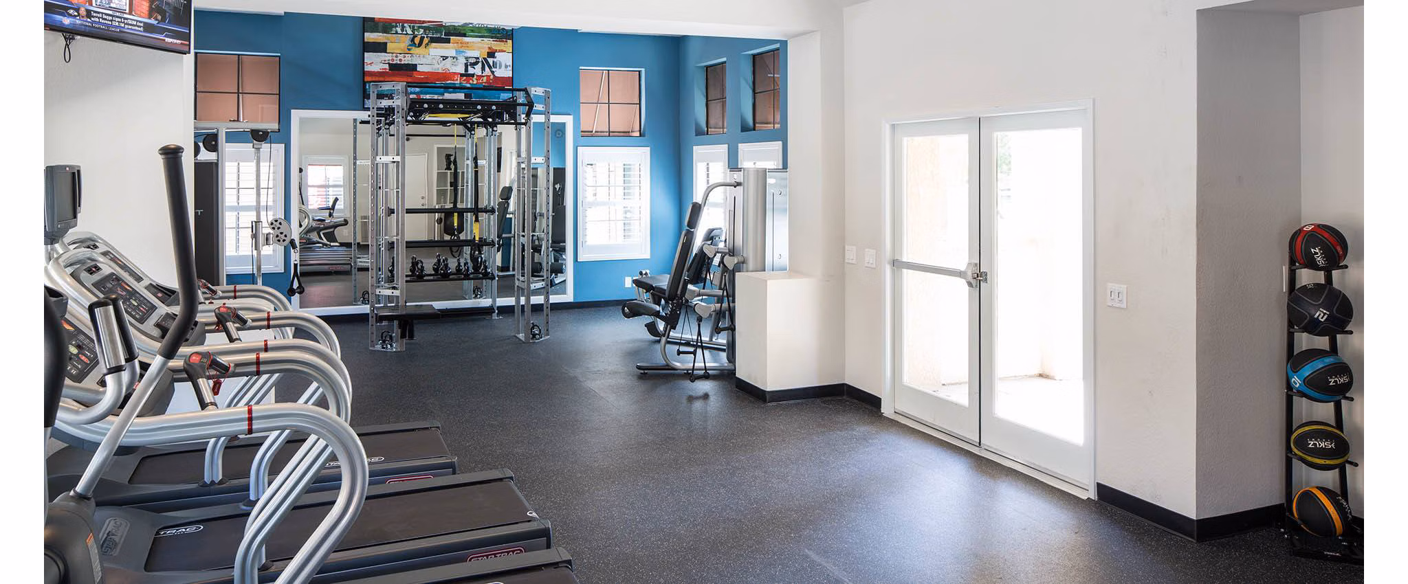Fitness center with state-of-the-art equipment at The Highlands at Grand Terrace Apartments