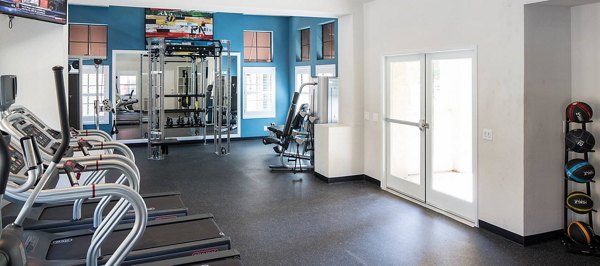 fitness center at The Highlands at Grand Terrace Apartments