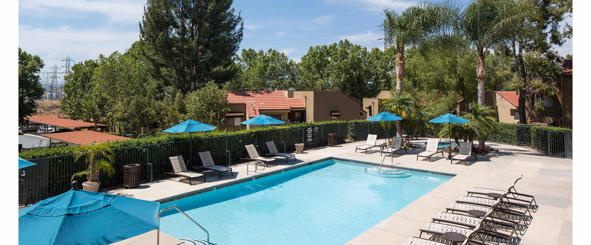 Rooftop pool with mountain views at The Highlands at Grand Terrace Apartments