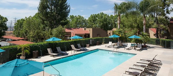 Rooftop pool with mountain views at The Highlands at Grand Terrace Apartments