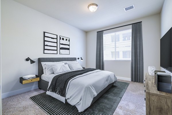 Cozy bedroom with stylish decor at Rockrimmon Apartments