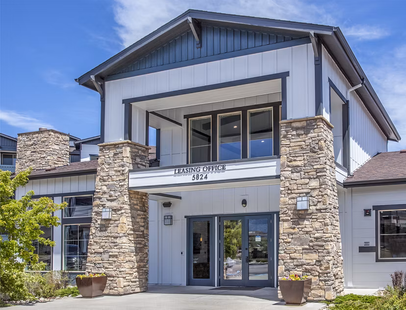 Elegant clubhouse with modern decor at Rockrimmon Apartments, offering a luxurious setting for community gatherings and events