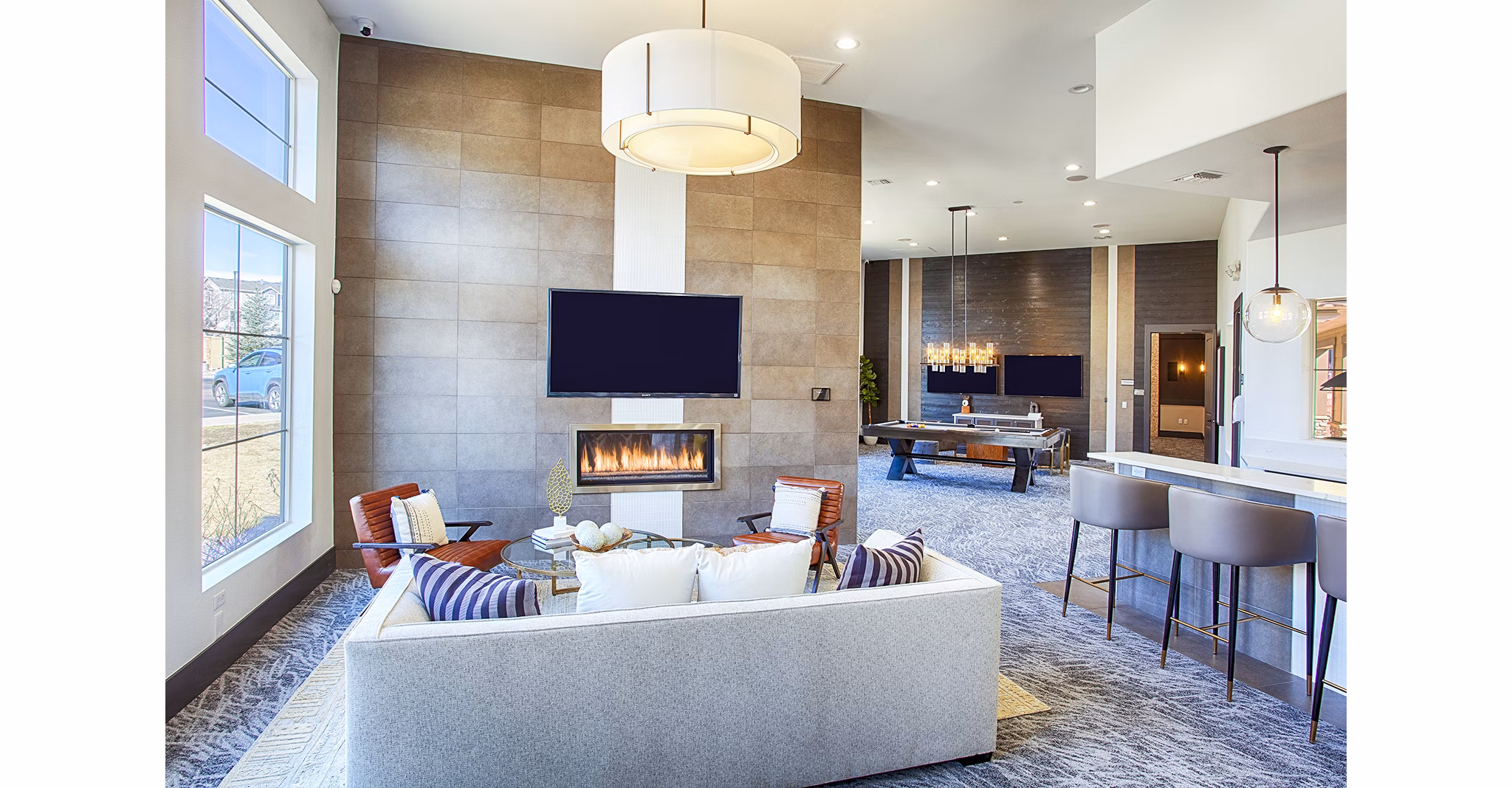 Rockrimmon Apartments: Clubhouse game room with pool table and modern seating