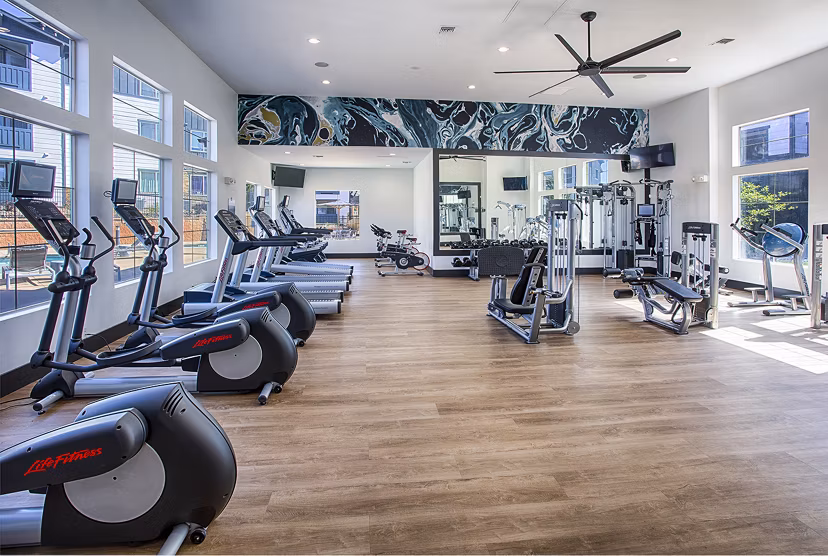 State-of-the-art fitness center with modern equipment at Rockrimmon Apartments