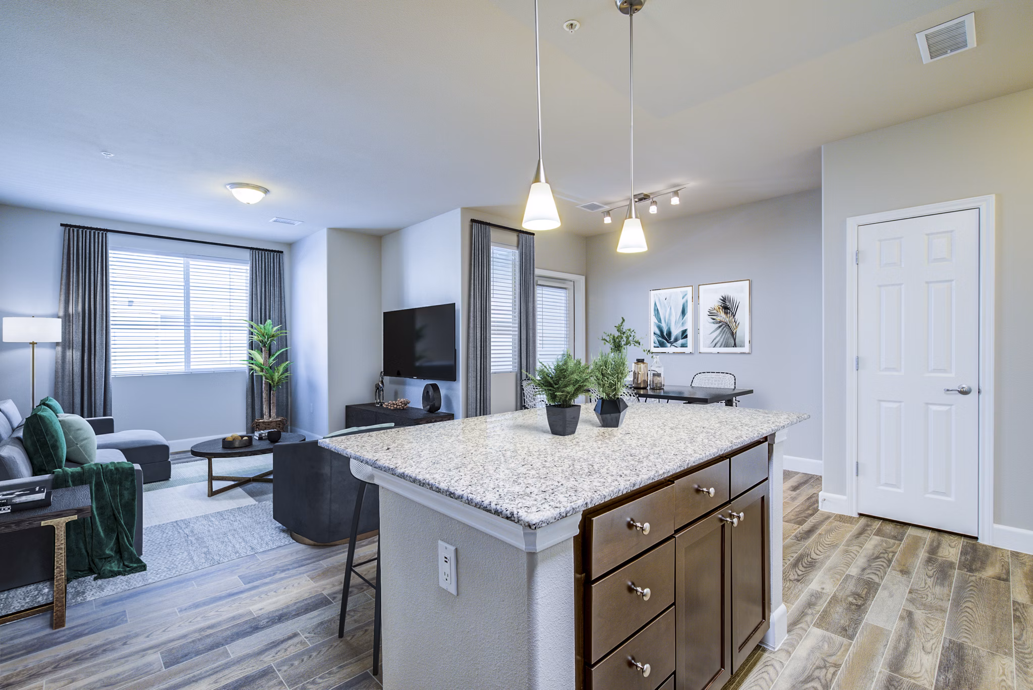 Modern kitchen with stainless steel appliances in Rockrimmon Apartments