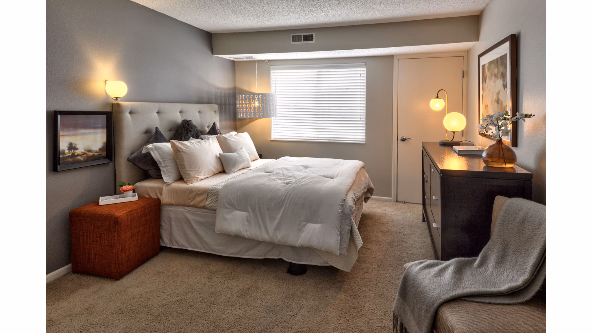 Cozy bedroom with modern decor at Avana Addison Apartments luxury living