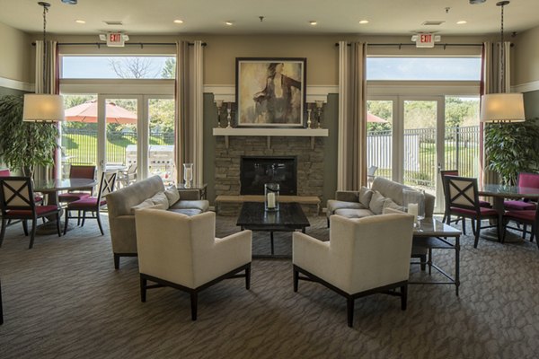 Elegant clubhouse featuring modern design and comfortable seating at Avana Addison Apartments