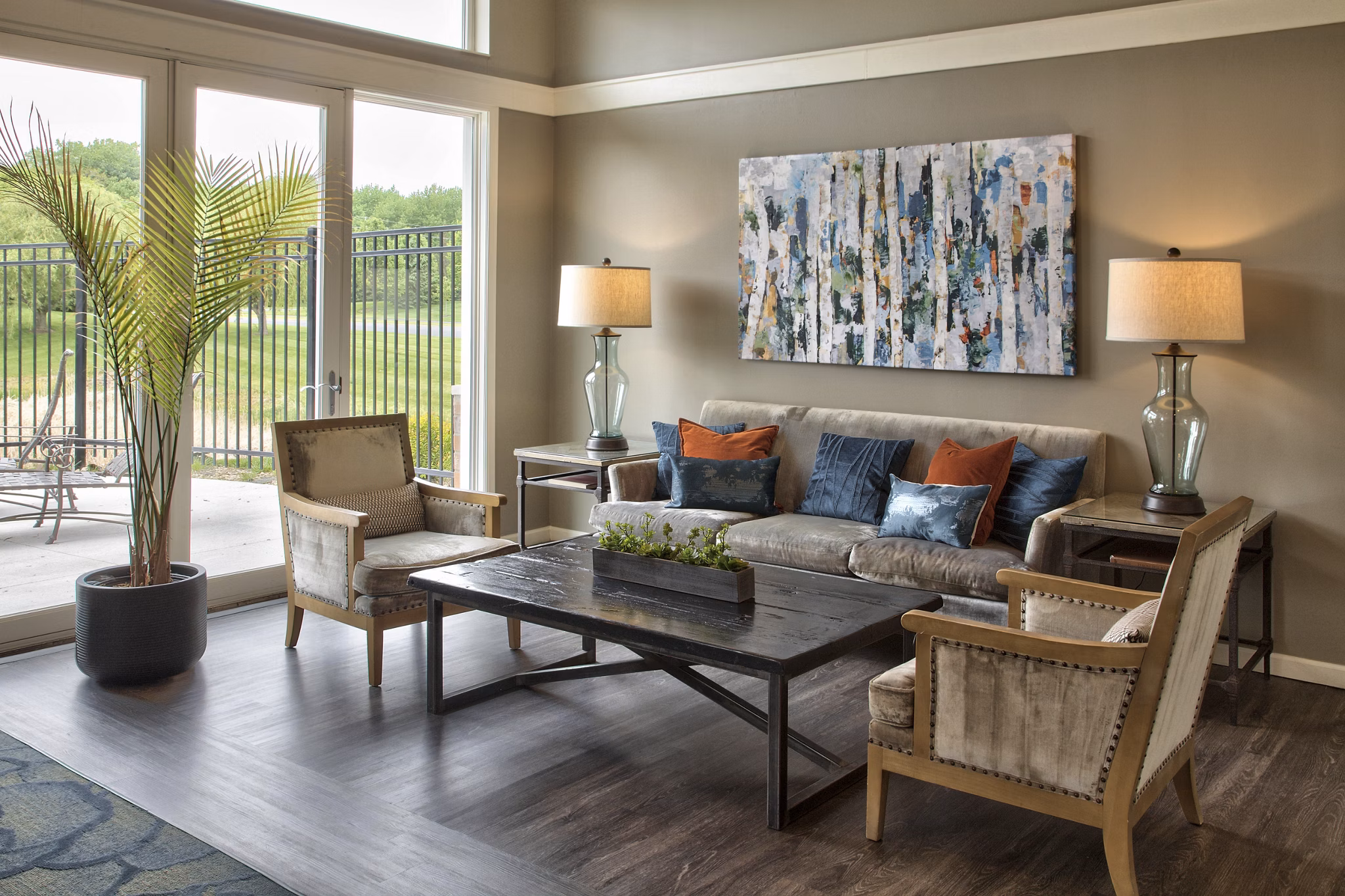 Clubhouse featuring modern design and lounging areas at Avana Addison Apartments