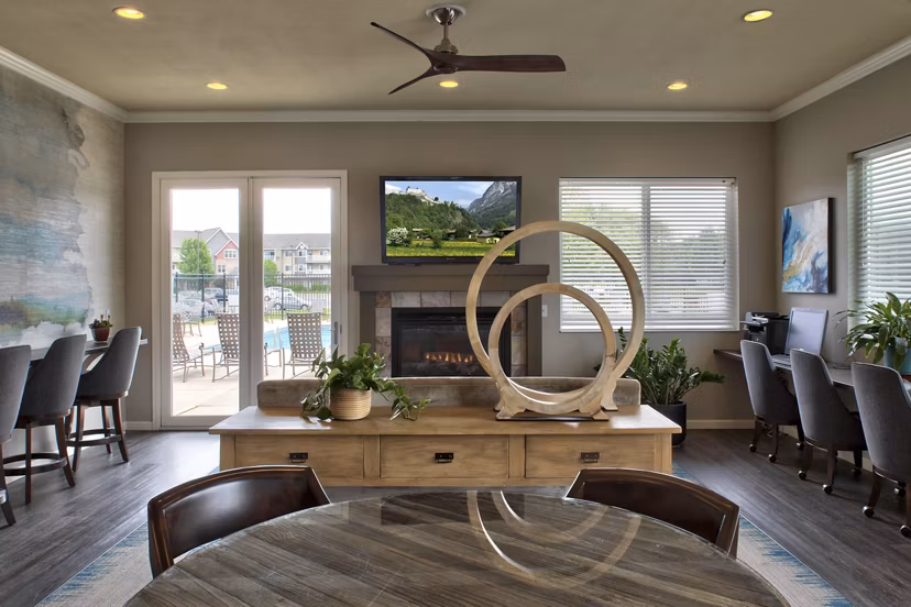 Modern clubhouse with sleek furnishings at Avana Addison Apartments, featuring luxury amenities and spaces for social gatherings