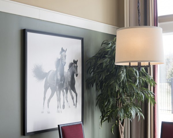 Contemporary dining area with modern furnishings at Avana Addison Apartments in luxury setting