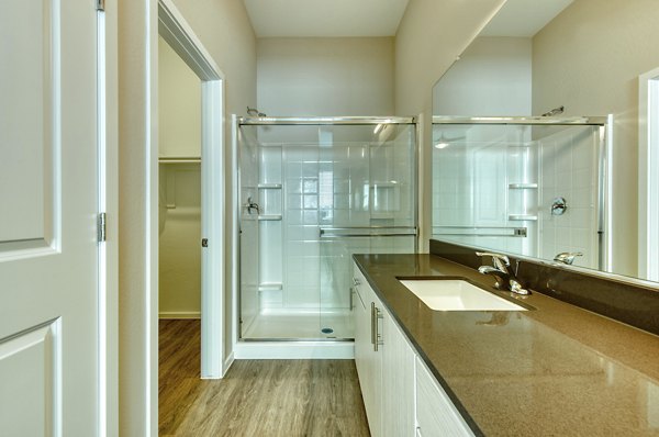 Bathroom featuring modern fixtures at Abode at Litchfield Park Apartments