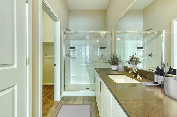 Modern bathroom with sleek fixtures at Abode at Litchfield Park Apartments