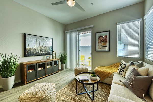 Spacious living room with modern design at Abode at Litchfield Park Apartments