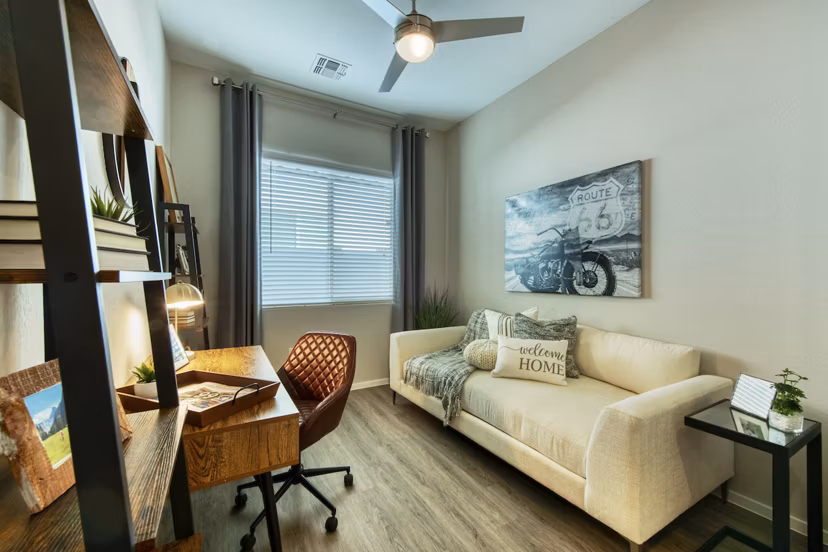 Elegant living room with modern decor at Abode at Litchfield Park Apartments, perfect for luxury living in a Greystar community