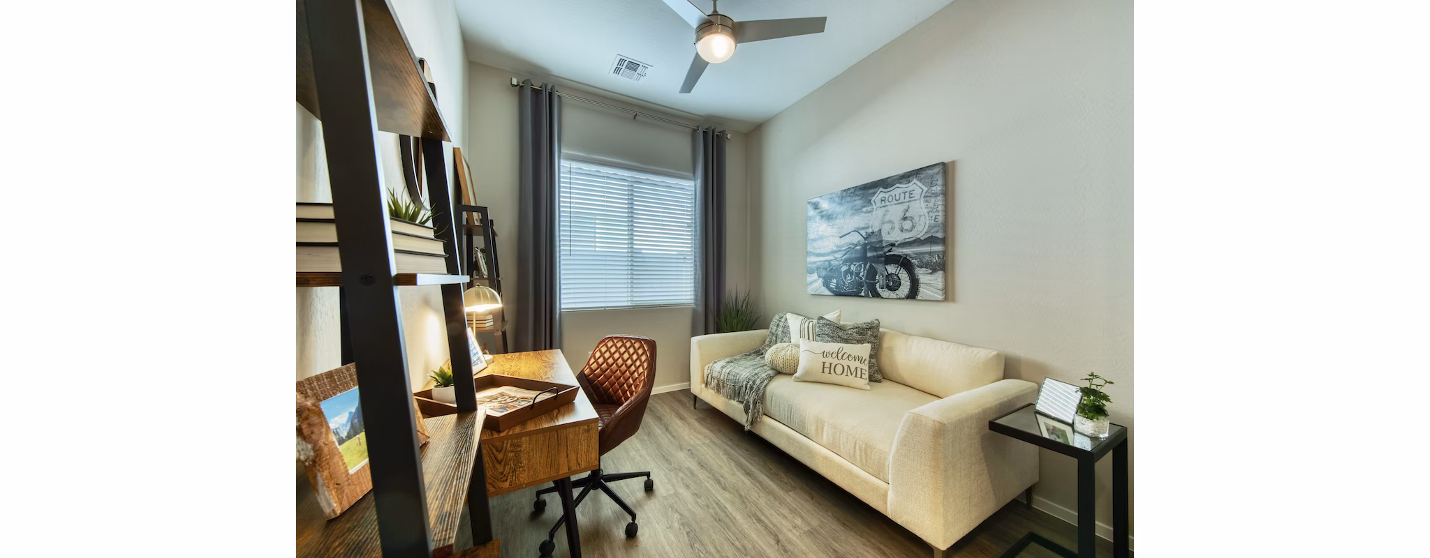 Elegant living room with modern decor at Abode at Litchfield Park Apartments, perfect for luxury living in a Greystar community
