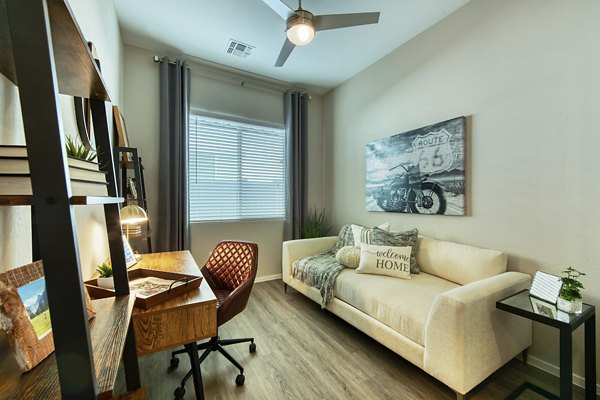 Elegant living room with modern decor at Abode at Litchfield Park Apartments, perfect for luxury living in a Greystar community
