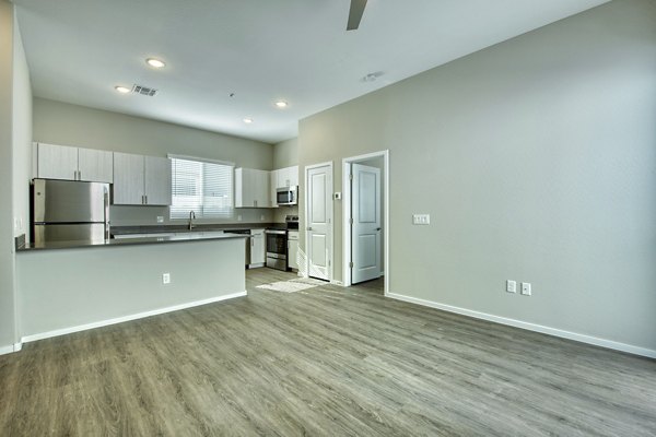 Cozy living room with modern decor at Abode at Litchfield Park Apartments