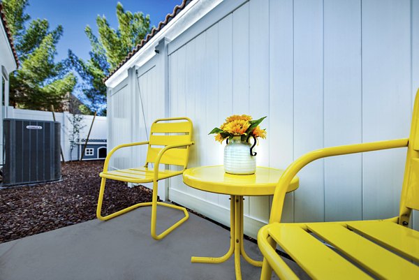 Spacious patio with stylish outdoor seating at Abode at Litchfield Park Apartments
