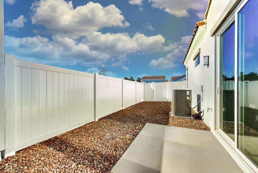 Abode at Litchfield Park Apartments: Stylish patio with modern seating and greenery for luxury outdoor living
