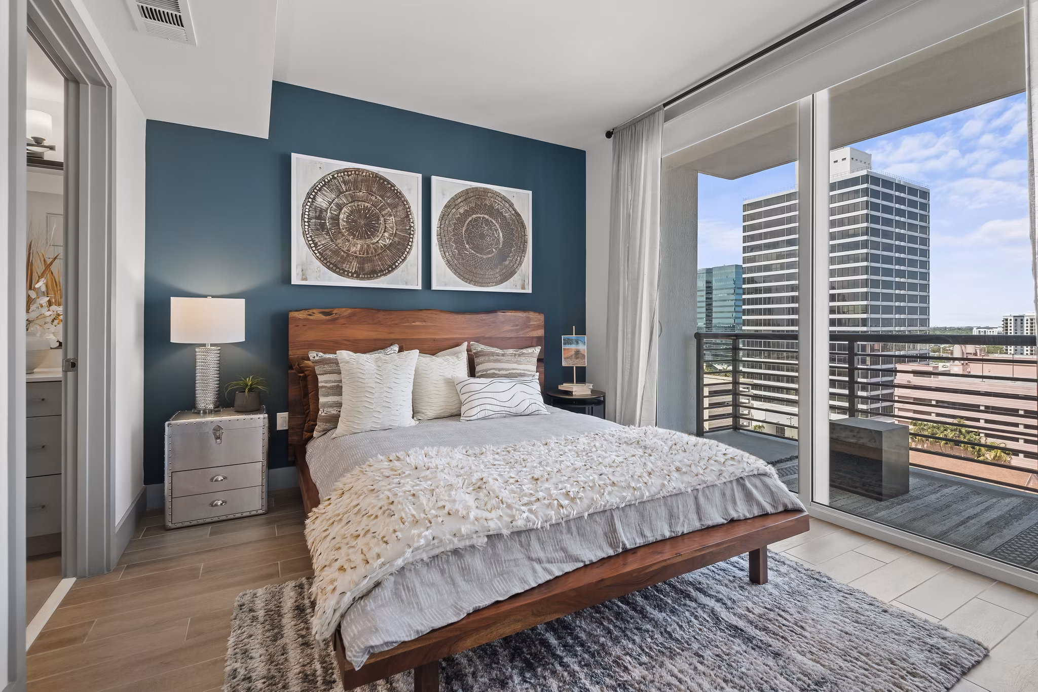 Spacious bedroom with modern furnishings at NOVO Las Olas Apartments