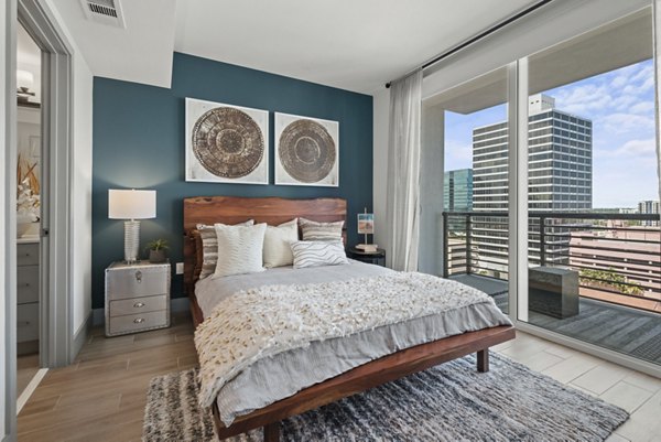 Spacious bedroom with modern furnishings at NOVO Las Olas Apartments