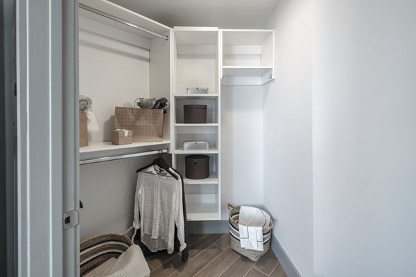 Spacious closet with custom shelving at NOVO Las Olas Apartments