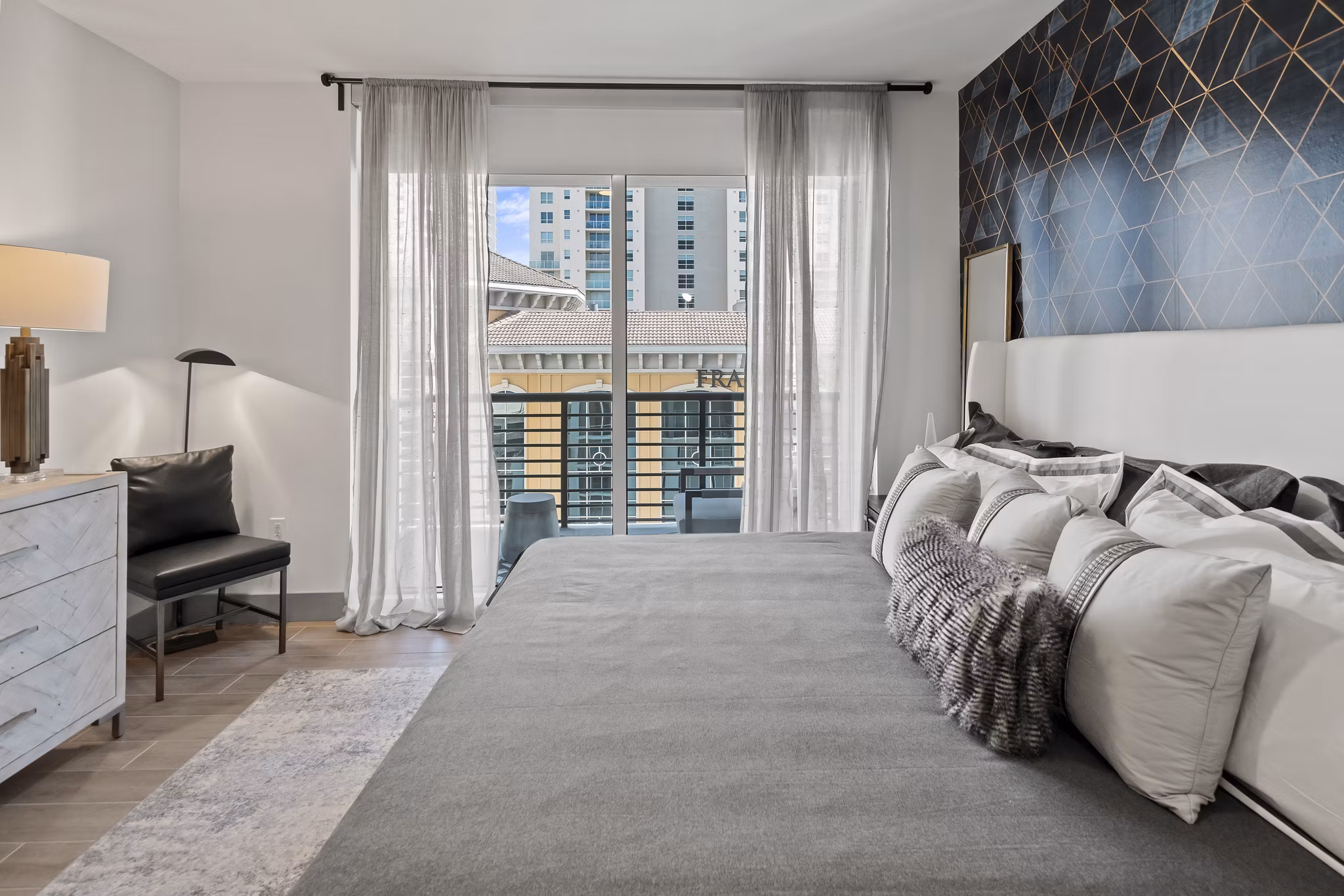 Chic bedroom with modern decor at NOVO Las Olas Apartments, offering luxury living in the heart of downtown Fort Lauderdale
