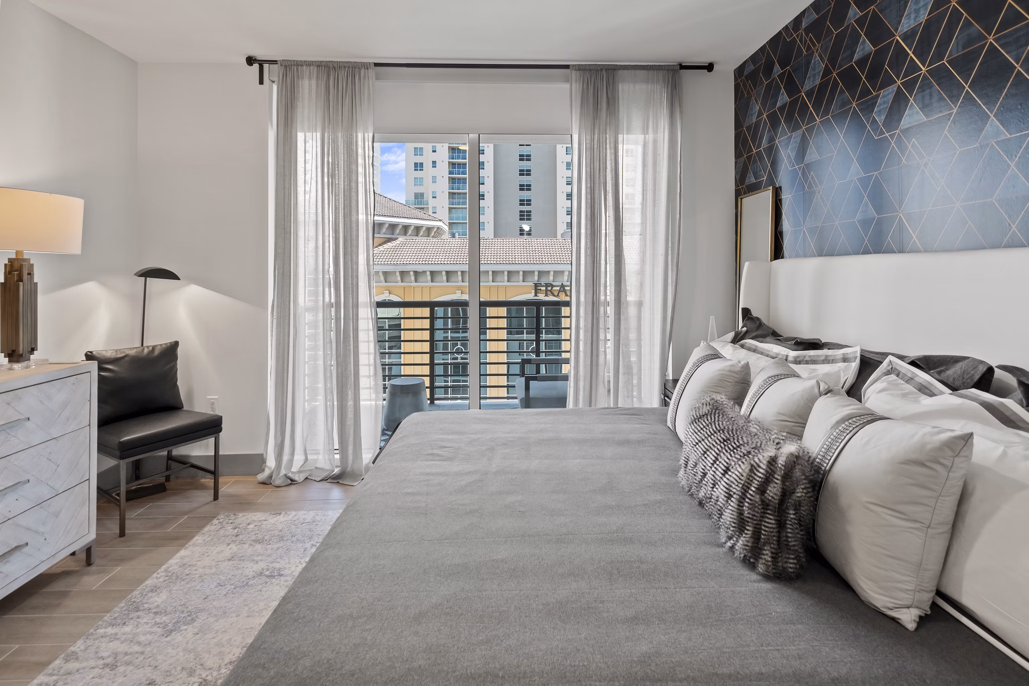 Chic bedroom with modern decor at NOVO Las Olas Apartments, offering luxury living in the heart of downtown Fort Lauderdale