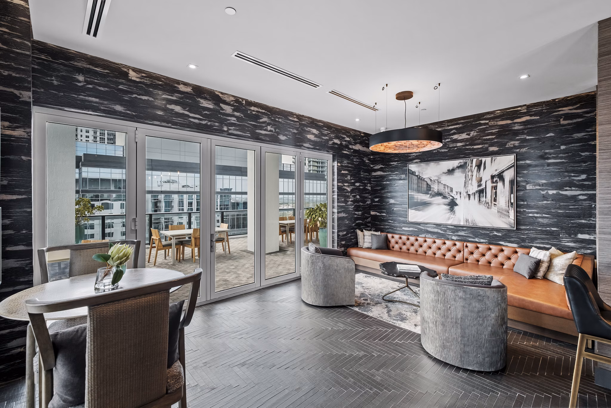 Contemporary clubhouse with plush seating at NOVO Las Olas Apartments in Fort Lauderdale