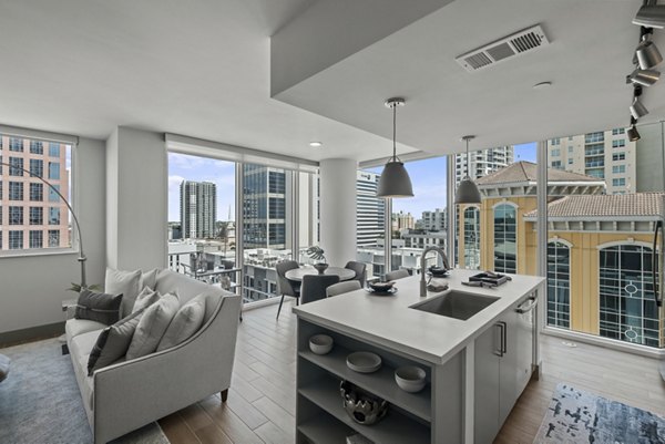 Modern kitchen with stainless steel appliances at NOVO Las Olas Apartments luxury complex