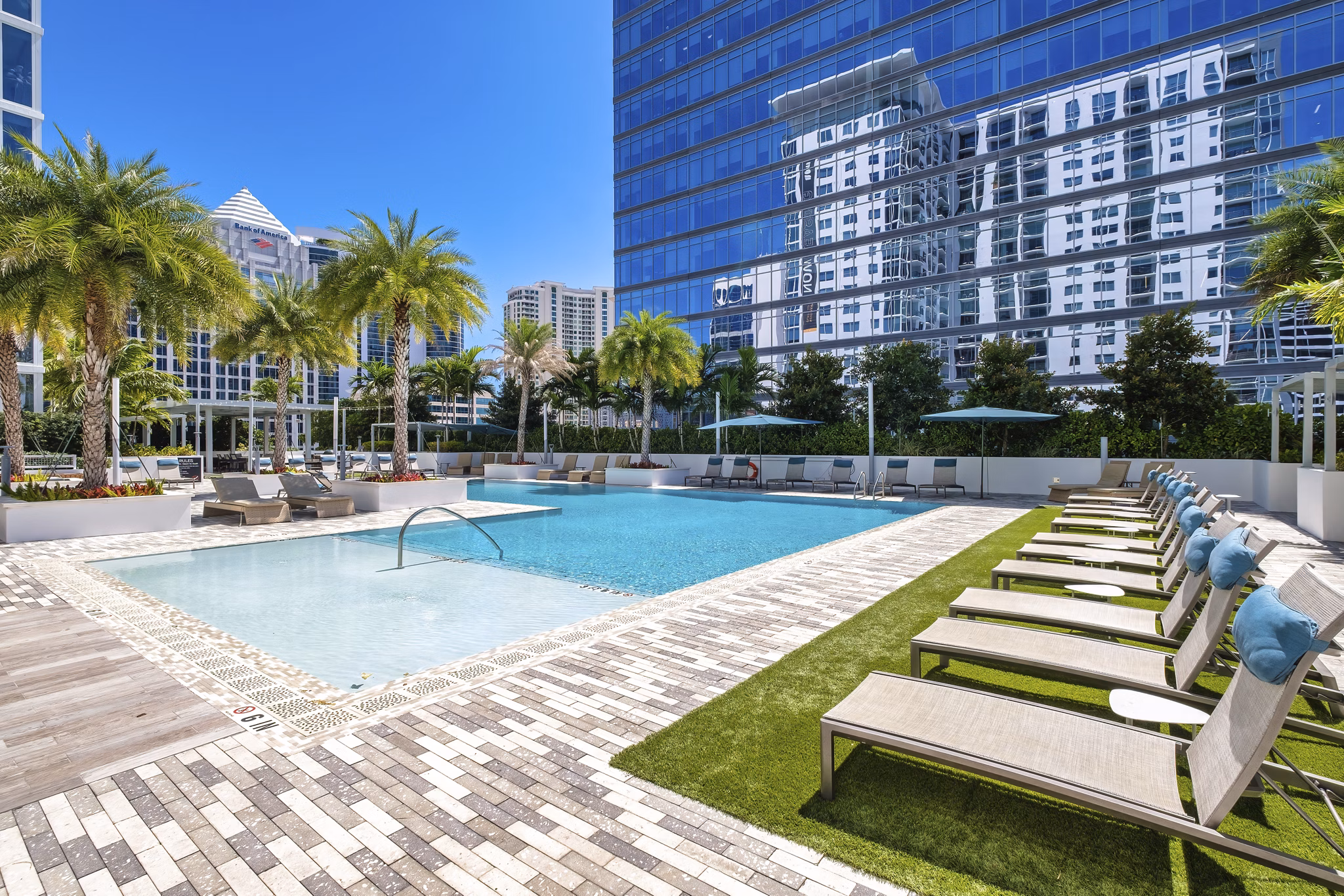 Elegant rooftop pool at NOVO Las Olas Apartments offering luxury relaxation with stunning views in downtown Fort Lauderdale