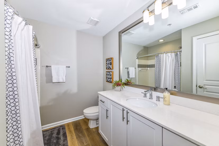 Modern bathroom with sleek fixtures and ample storage at Avana Cheshire Bridge Apartments, offering luxurious living in Atlanta