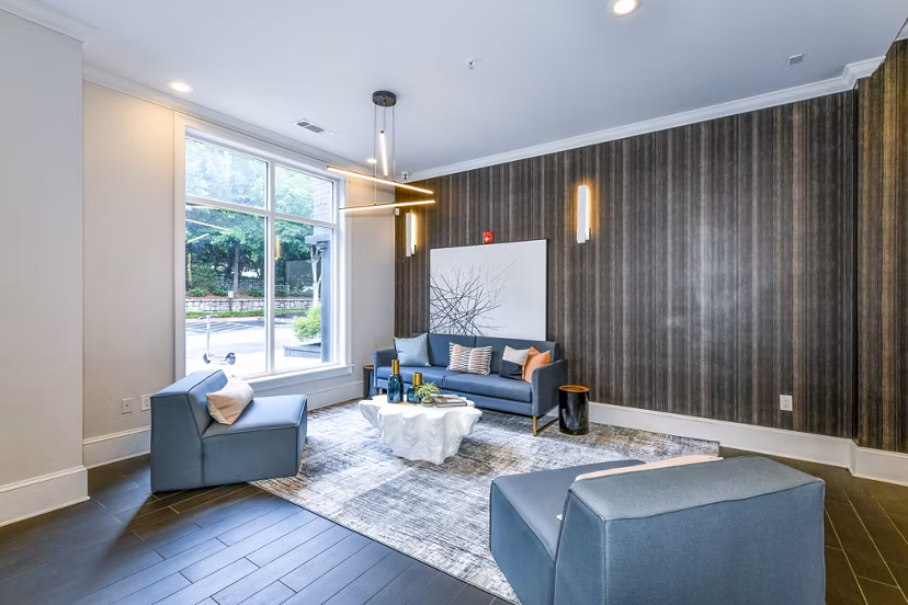 Modern clubhouse featuring elegant lobby area at Avana Cheshire Bridge Apartments, offering luxurious amenities and stylish design