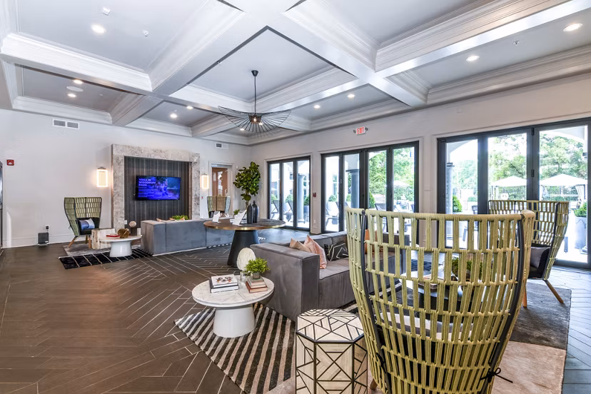 Clubhouse lobby with elegant seating and modern decor at Avana Cheshire Bridge Apartments