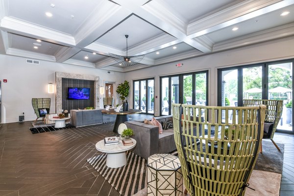 Clubhouse lobby with elegant seating and modern decor at Avana Cheshire Bridge Apartments