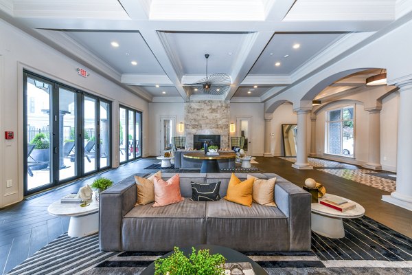 Elegant lobby with modern furnishings at Avana Cheshire Bridge Apartments, offering luxury amenities in a welcoming atmosphere