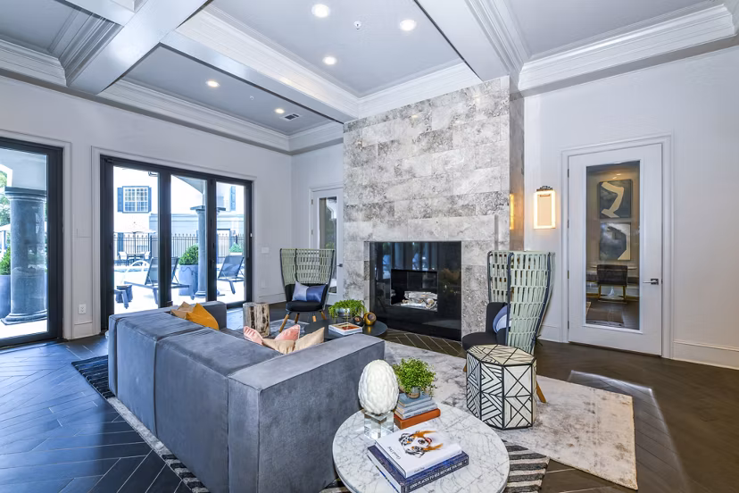 Clubhouse featuring modern lounge seating in Avana Cheshire Bridge apartments