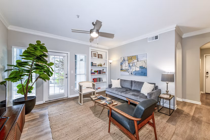 Spacious living room with modern decor at Avana Cheshire Bridge Apartments