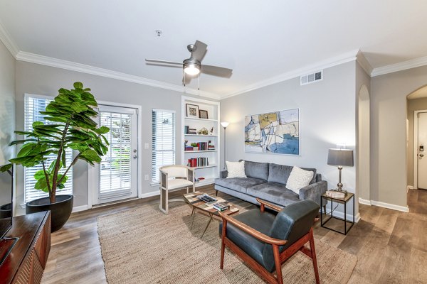 Spacious living room with modern decor at Avana Cheshire Bridge Apartments