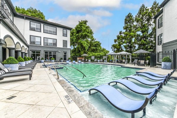 Resort-style swimming pool at Avana Cheshire Bridge Apartments in Atlanta offering luxury leisure and relaxation