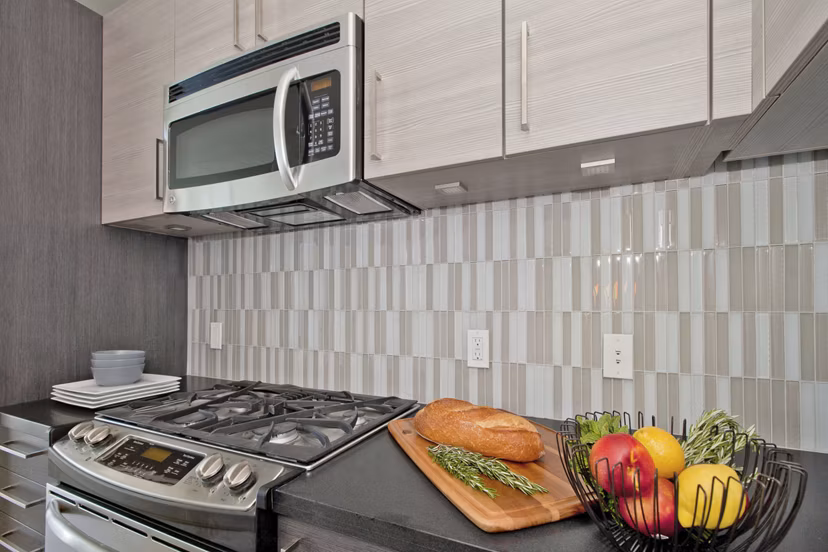 Modern kitchen with sleek countertops and stainless steel appliances at 38 Dolores Apartments