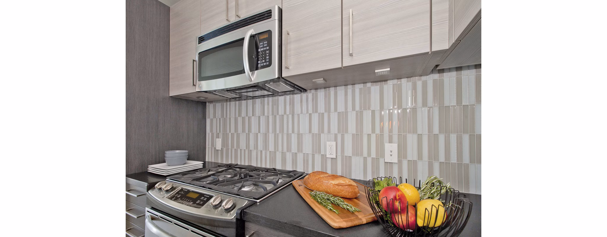 Modern kitchen with sleek countertops and stainless steel appliances at 38 Dolores Apartments