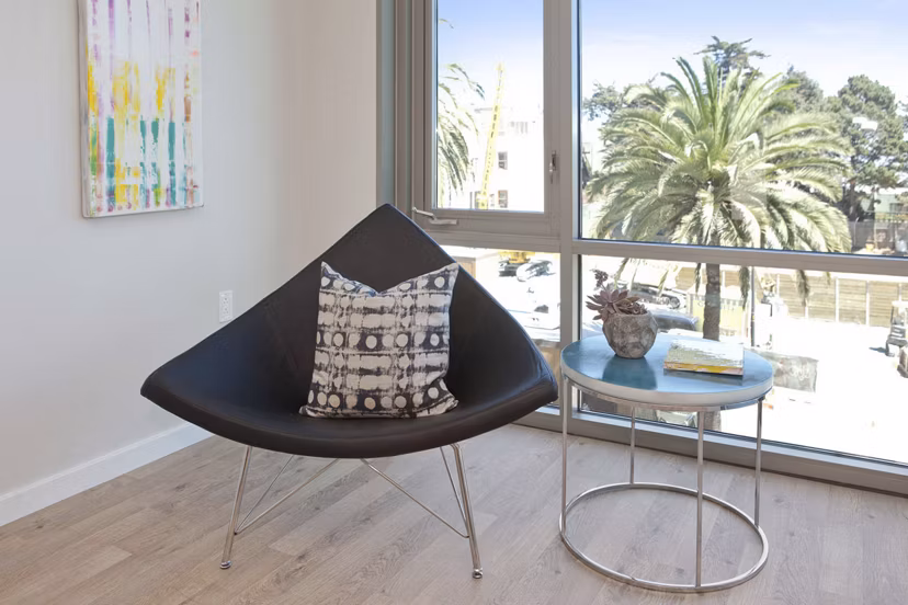 Modern living room with stylish furniture and natural lighting at 38 Dolores Apartments, featuring luxurious Greystar design elements