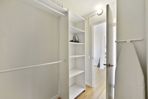 Spacious closet with ample storage featuring modern design in Nob Hill Tower Apartments