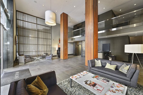 Elegant lobby area featuring modern decor and seating at Nob Hill Tower Apartments, a luxury high-rise in the heart of the city